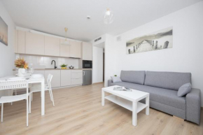 Air Conditioned Apartment in Warsaw with Parking, Desk and Balcony by Noclegi Renters